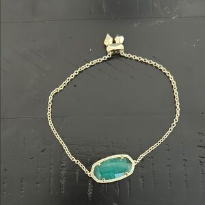 Elegant Gold Bracelet with Green Stone